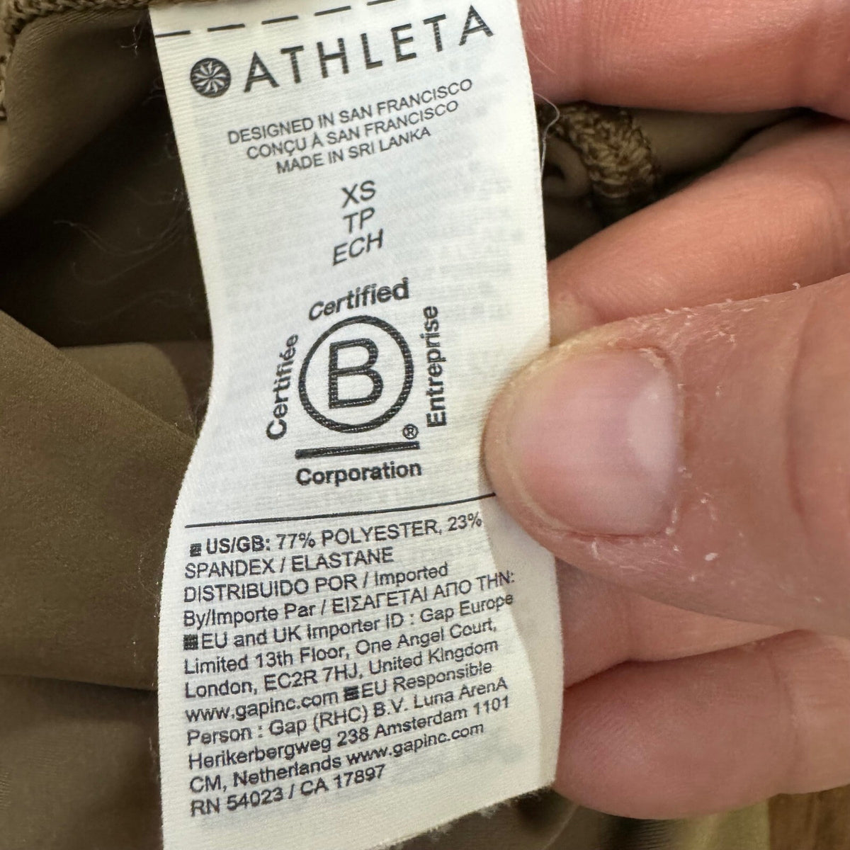Athleta Interval Stash Lasercut 7/8 Tight Womens XS Brown Compression Leggings